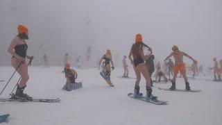 Swimsuit-clad skiers slide down slopes in Russia's Sochi